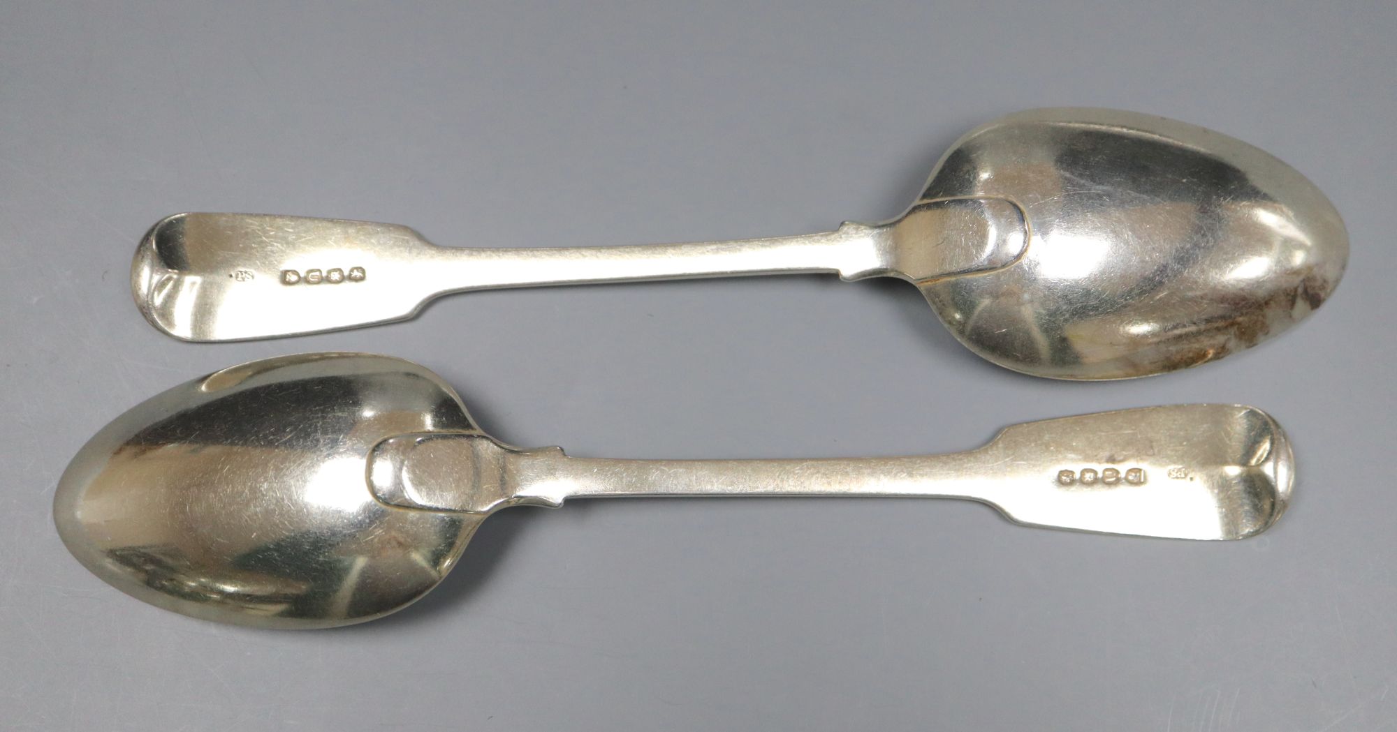 A pair of George III silver fiddle pattern table spoons by Paul Storr, London, 1815, 22cm, 5 oz.